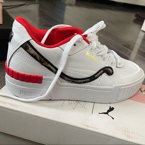 Limited Edition White/Red/Cheetah Print Puma’s. They are brand new!